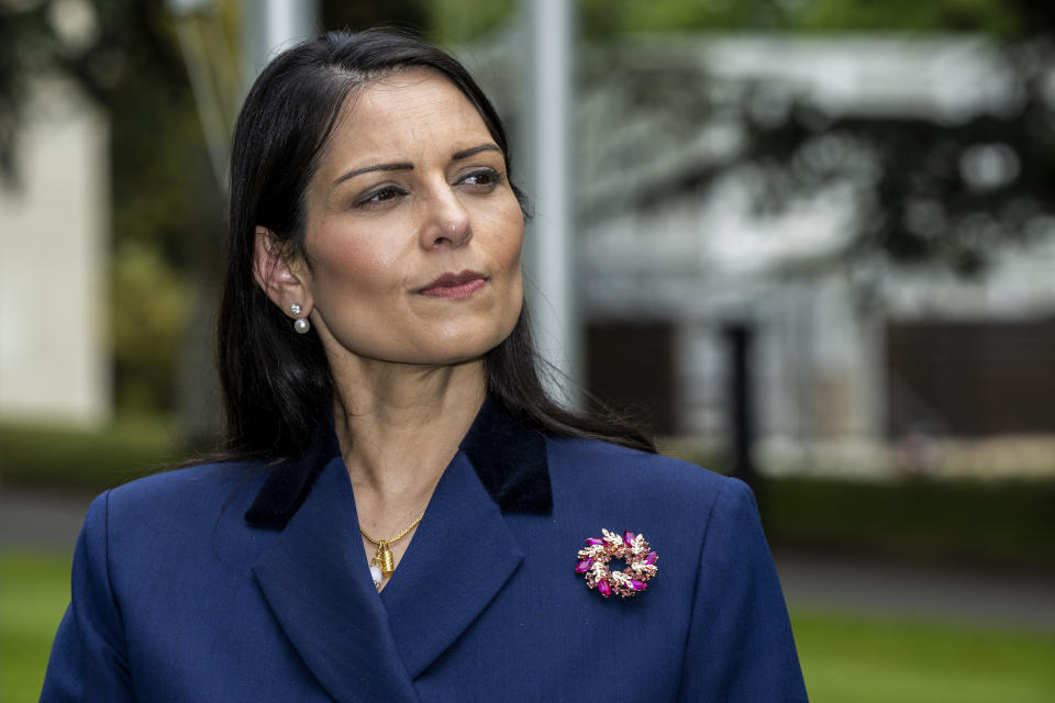 Britain's Home Secretary Priti Patel speaks during an interview with the Associated Press at the European headquarters of the United Nations in Geneva, Switzerland, Thursday, May 19, 2022. (Martial Trezzini/Keystone via AP)