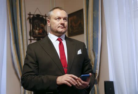 Ukrainian lawmaker Andriy Artemenko watches a news conference of Prosecutor General Yuriy Lutsenko and Head of the Security Service of Ukraine (SBU) Vasyl Hrytsak at his office in Kiev, Ukraine, February 21, 2017. REUTERS/Valentyn Ogirenko