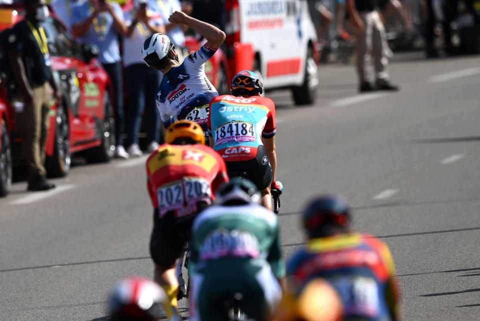 BOURGENBRESSE FRANCE  JULY 20 Detailed view of Kasper Asgreen of Denmark and Team Soudal  Quick Step celebrates at finish line as stage winner ahead of Pascal Eenkhoorn of The Netherlands and Team Lotto Dstny and Jonas Abrahamsen of Norway and UnoX Pro Cycling Team during the stage eighteen of the 110th Tour de France 2023 a 1849km stage from Motiers to BourgenBresse  UCIWT  on July 20 2023 in BourgenBresse France Photo by Tim de WaeleGetty Images