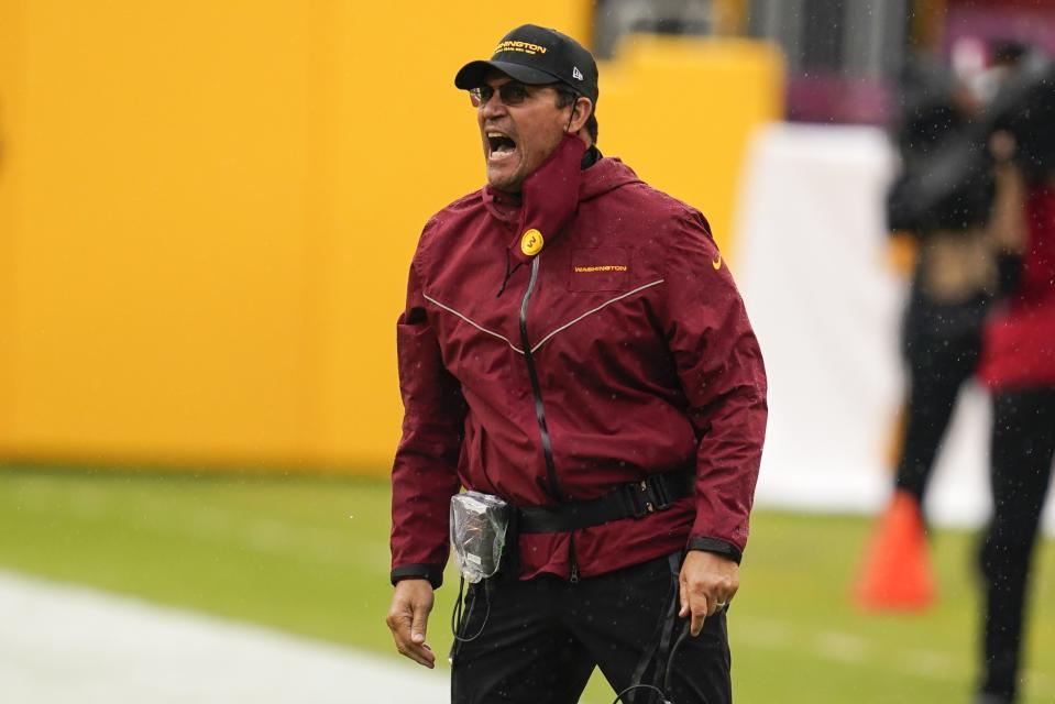 Washington Football Team head coach Ron Rivera reacts during the first half of an NFL football game against the Los Angeles Rams Sunday, Oct. 11, 2020, in Landover, Md. (AP Photo/Steve Helber)