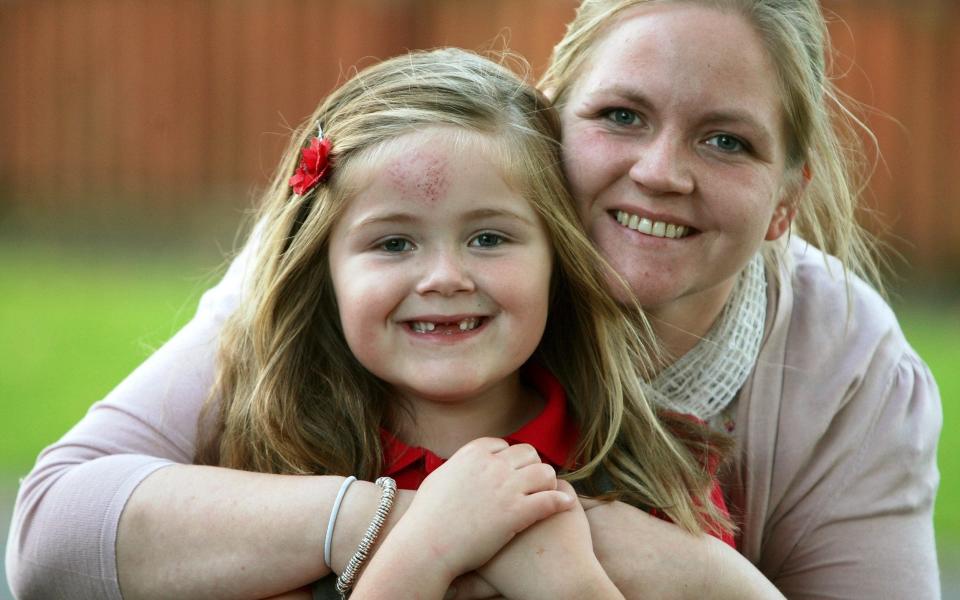 Niamh Riley, pictured with her mother Regina in 2010, tugged on David Cameron's heartstrings - Dave Thompson/PA Wire