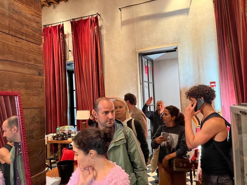 Joseph Benigno, owner of Best Buy Auctioneers, leading a group of shoppers into the Gramercy Park Hotel in New York City