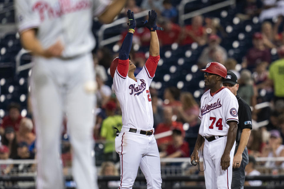 Washington Nationals' Juan Soto (22) gestures during the sixth inning of a baseball game against the Philadelphia Phillies in Washington, Tuesday, Aug. 3, 2021. (AP Photo/Manuel Balce Ceneta)