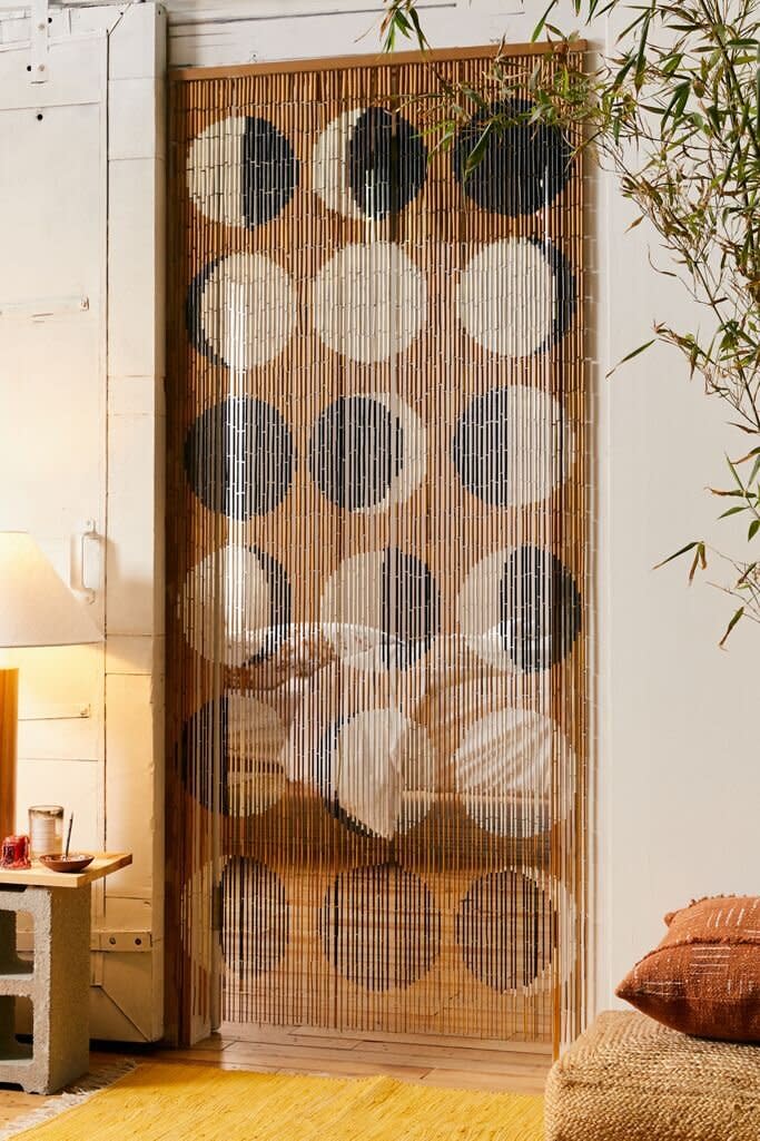 A rad curtain for all your <a href="https://www.huffpost.com/entry/bohemian-furniture-and-home-decor_n_59e7a9e0e4b00905bdae6e54" target="_blank" rel="noopener noreferrer">rattan furniture</a>. <a href="https://fave.co/3cKXEQr" target="_blank" rel="noopener noreferrer">Find it for $59 at Urban Outfitters</a>. 