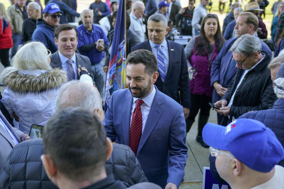 Mike Lawler greets supporters after a news conference, Wednesday, Nov. 9, 2022, in New City, N.Y. (AP Photo/Mary Altaffer)