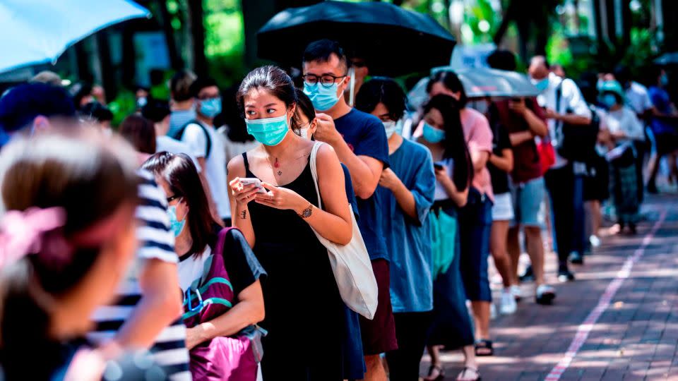 Voters waiting to vote during primary elections in Hong Kong on July 12, 2020. - ISAAC LAWRENCE/AFP/AFP via Getty Images