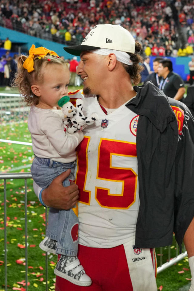 Patrick Mahomes Nails Dad Duty as He Wears Daughter Sterling in a