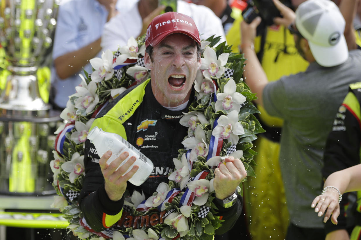 Simon Pagenaud, of France, celebrates after winning the Indianapolis 500 IndyCar auto race at Indianapolis Motor Speedway, Sunday, May 26, 2019, in Indianapolis. (AP Photo/Darron Cummings)