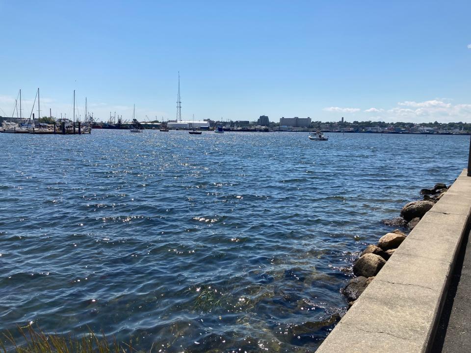 The monument dedicated to Captain Joshua Slocum faces seaward from Fairhaven to New Bedford.