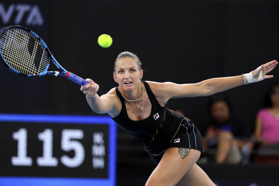 Karolina Pliskova of the Czech Republic plays a shot in her match against Jelena Ostapenko of Latvia during the Brisbane International tennis tournament in Brisbane, Australia, Thursday, Jan. 4, 2024. (AP Photo/Tertius Pickard)