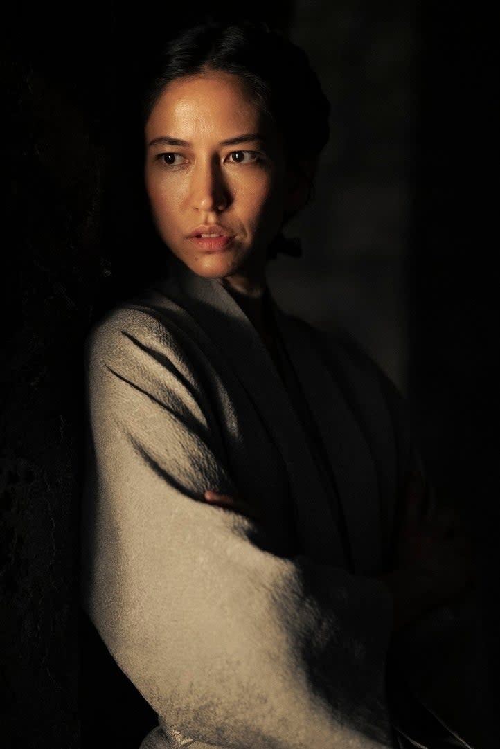 Sonoya Mizuno with shadows around her face in a scene from 