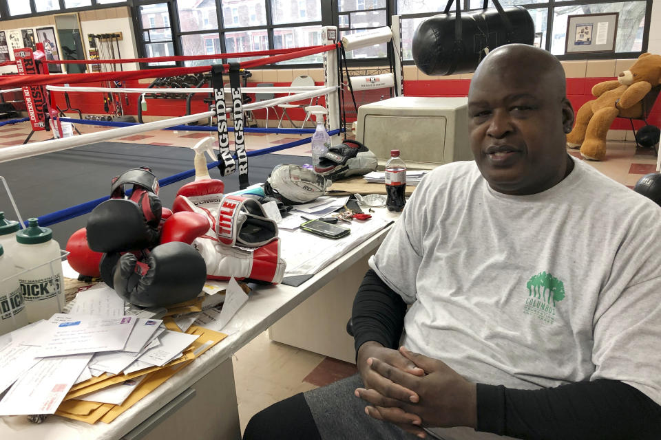 In this Jan. 31, 2020 photo, James "Buster" Douglas, the former world heavyweight champion, sits at the Thompson Community Center in Columbus, Ohio, where he teaches youth boxing. In one of the more spectacular upsets in sports history, Douglas defeated Mike Tyson, the reigning world heavyweight champion on Feb. 11, 1990, in Tokyo. (AP Photo/Julie Carr Smyth)