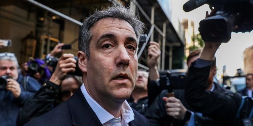 FILE PHOTO: Michael Cohen, U.S. President Donald Trump's former lawyer, leaves his apartment to report to prison in Manhattan, New York, U.S., May 6, 2019. REUTERS/Jeenah Moon/File Photo