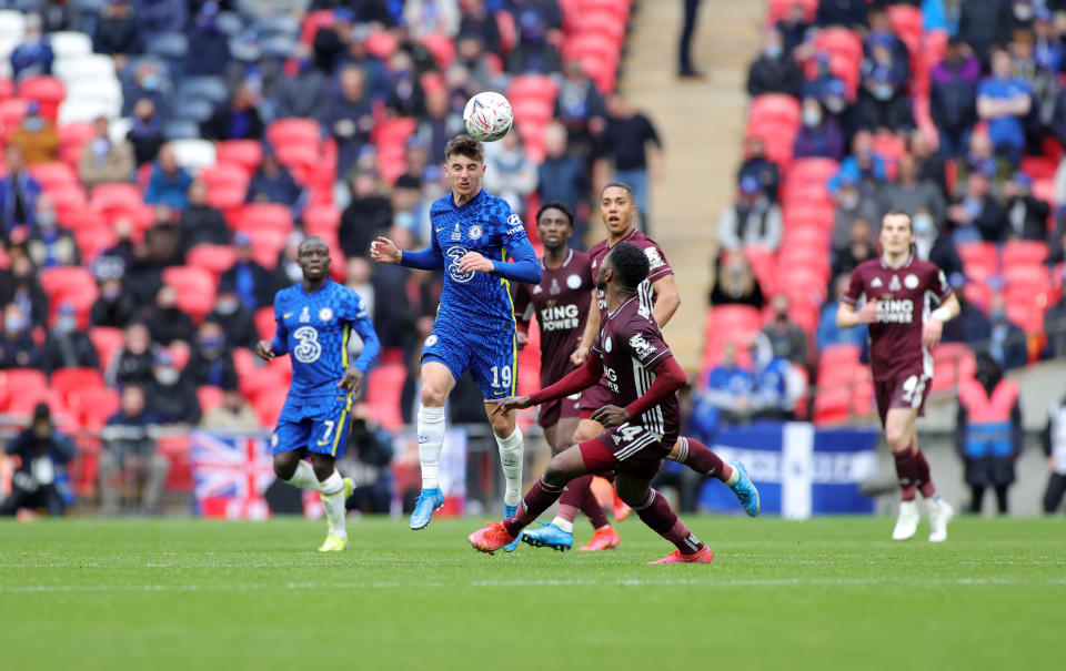 Kelechi Iheanacho of Leicester City in action with Mason Mount of Chelsea during The Emirates FA Cup Final match in 2021.