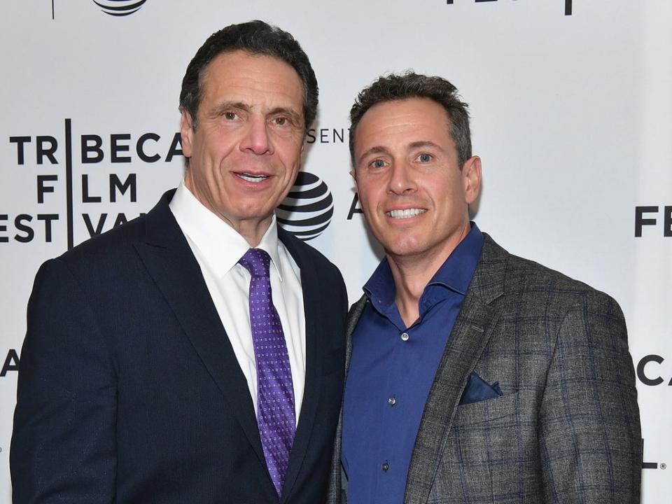 Chris, right, was fired after misleading CNN about his involvement in his brother Andrew’s sexual harassment scandal (Getty Images)