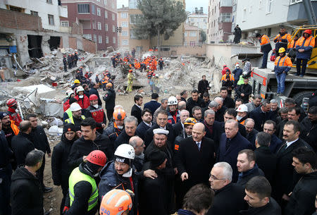 Turkish President Tayyip Erdogan visits the site of a collapsed residential building in Istanbul, Turkey February 9, 2019. Murat Kula/Presidential Press Office/Handout via REUTERS