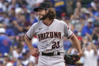 Arizona Diamondbacks starting pitcher Zac Gallen reacts after Chicago Cubs' Matt Duffy walked to first during the third inning of a baseball game in Chicago, Friday, July 23, 2021. (AP Photo/Nam Y. Huh)