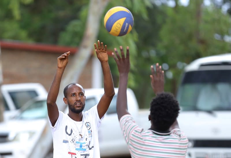 Asylum-seekers who arrived from Libya, play at the United Nations emergency transit centre in Gashora