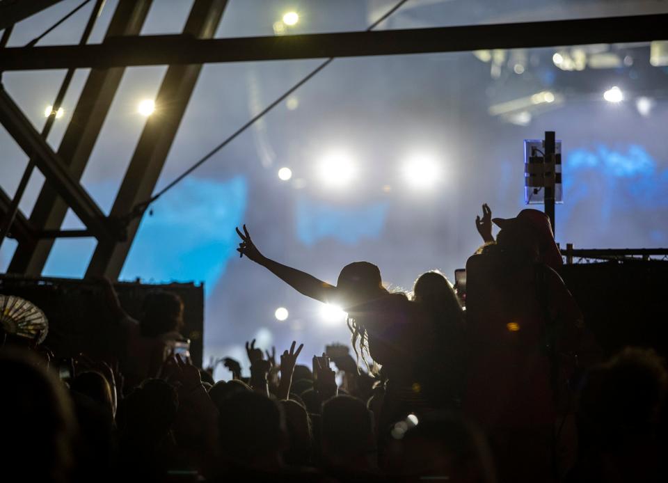 Festivalgoers cheer for Metro Boomin & Friends at the far back end of the Sahara tent during the Coachella Valley Music and Arts Festival at the Empire Polo Club in Indio, Calif., Friday, April 21, 2023. 