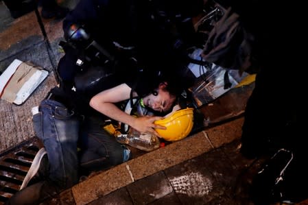 FILE PHOTO: Hong Kong democracy activists march in Hong Kong's Central and Western districts