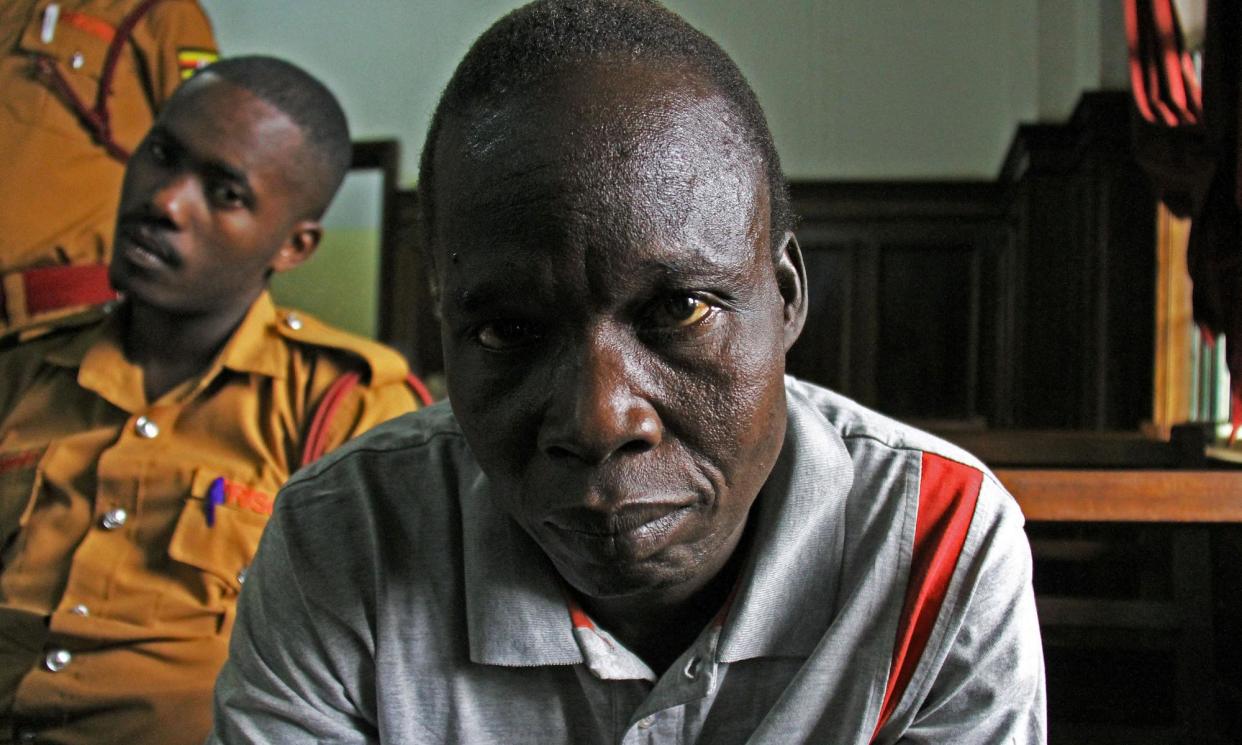 <span>Thomas Kwoyelo at a hearing in 2017 in the high court in Kampala, Uganda. On 13 August a landmark trial in Gulu convicted him of crimes against humanity.</span><span>Photograph: G Grilhot/AFP/Getty</span>