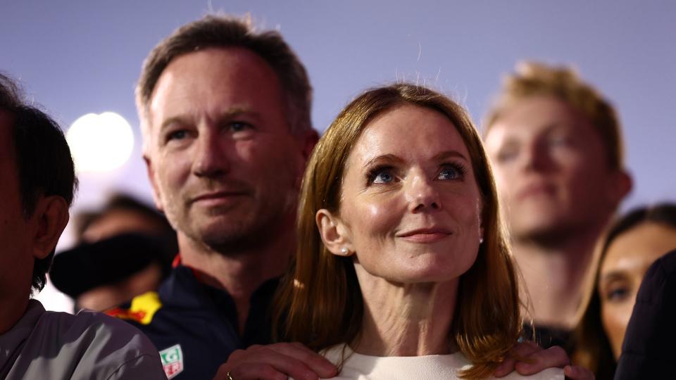 Christian Horner resting his hands on Geri Horner's shoulders