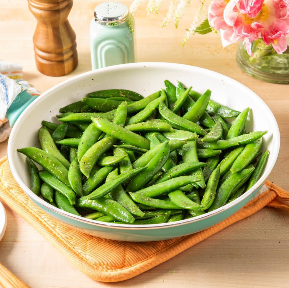 sauteed sugar snap peas in bowl