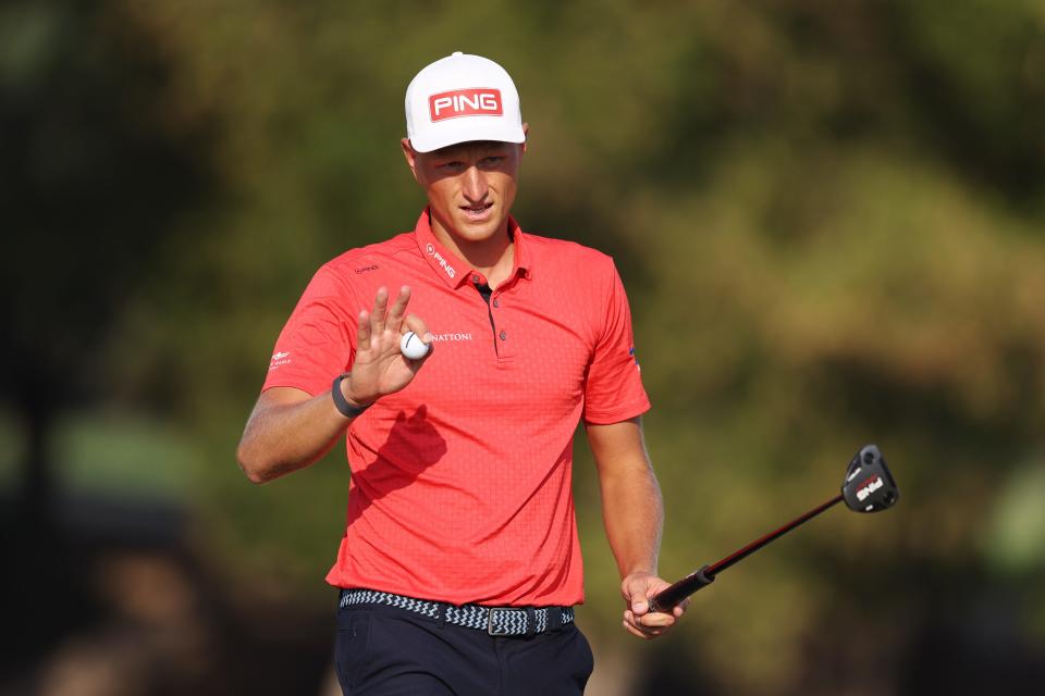 Adrian Meronk celebrates a birdie putt on the 14th green during the final round of the 2024 Hero Dubai Desert Classic at Emirates Golf Club in Dubai, United Arab Emirates. (Photo: Richard Heathcote/Getty Images)