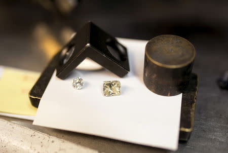 Diamonds are seen at a polishing factory in Ramat Gan near Tel Aviv, Israel June 22, 2015. customers who prefer hi-tech gadgets to bling. Picture taken June 22, 2015. REUTERS/Baz Ratner