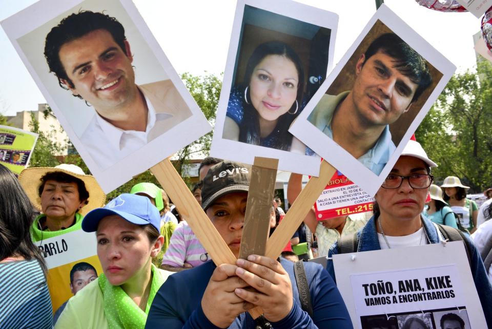 Mothers call for justice in the "March of Dignity" on Mother's Day 2014 in Mexico City.