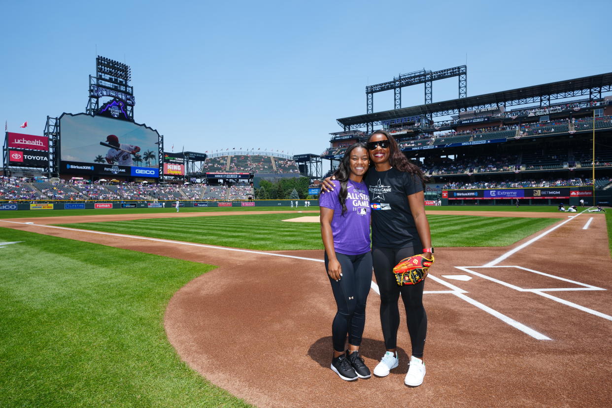Odicci Alexander and Natasha Watley after the ceremonial first pitch prior to the 2021 Futures Game at Coors Field in Denver as part of MLB All-Star week. (Daniel Shirey/MLB Photos via Getty Images)