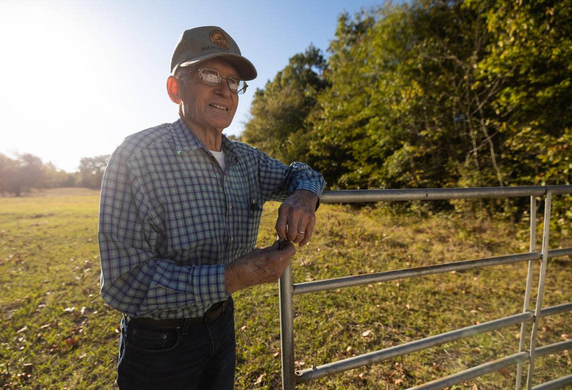 Gary Cheatwood, 92, opens the gate to the ranch Oct. 19, 2022, near Cuthand, Texas. The property would flooded if the Marvin Nichols Reservoir project is approved.