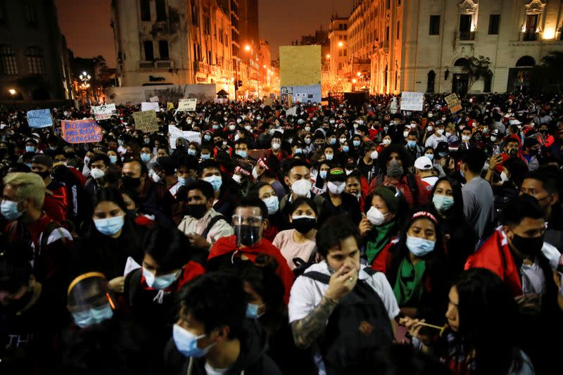 FILE PHOTO: People gather after Francisco Sagasti from the Centrist Morado Party was elected Peru's interim president by Congress, in Lima