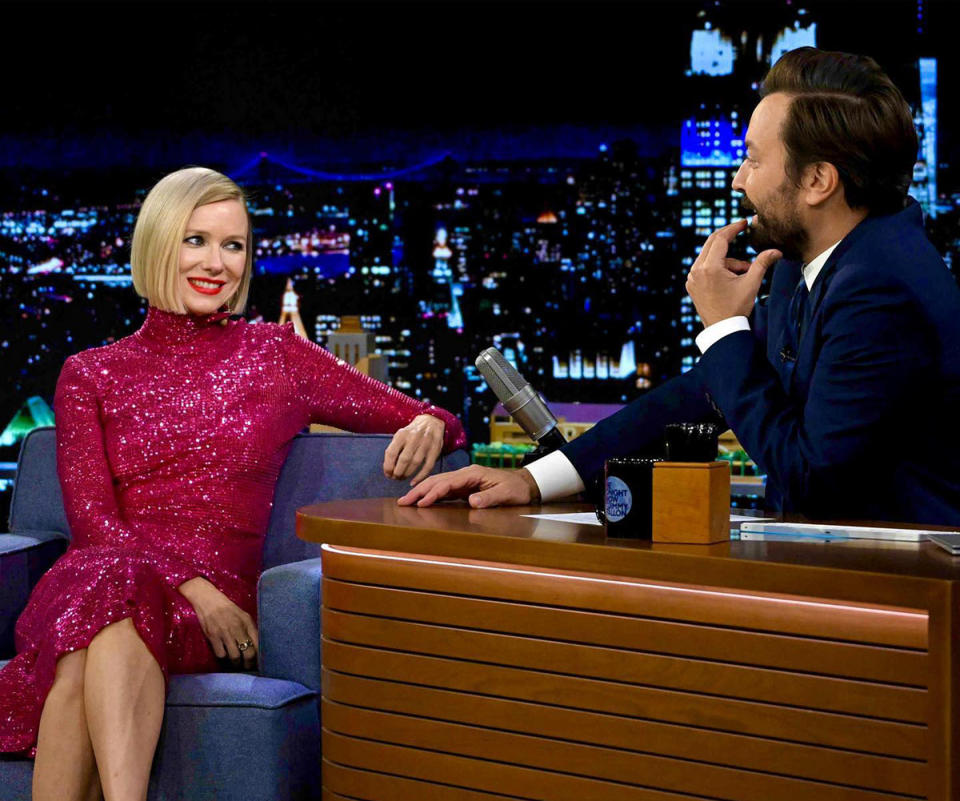 Naomi Watts talking to Jimmy Fallon on the set of The Tonight Show