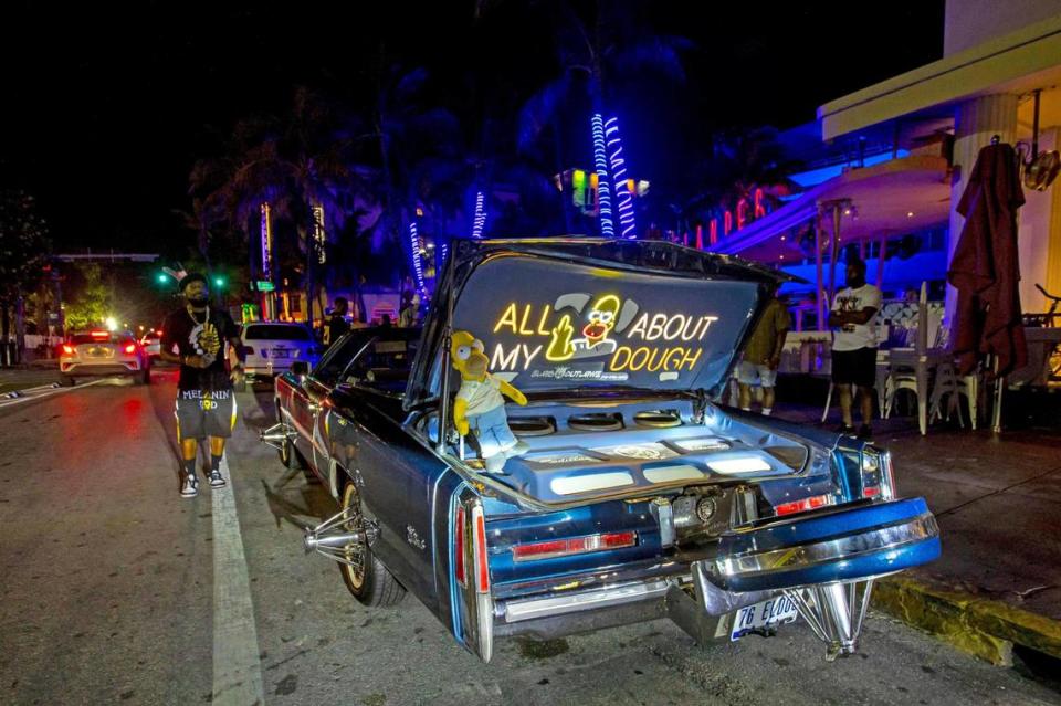 A car sits parked on Ocean Drive during the first day of Memorial Day Weekend in Miami Beach, Florida, on Friday, May 27, 2022.