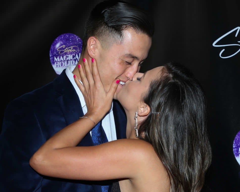 John Hersey (L) and Katie Thurston (R) attend Stephen Lovegrove's First Noelle Ball at Mavericks Beach Club on December 02, 2021 in San Diego, California. 