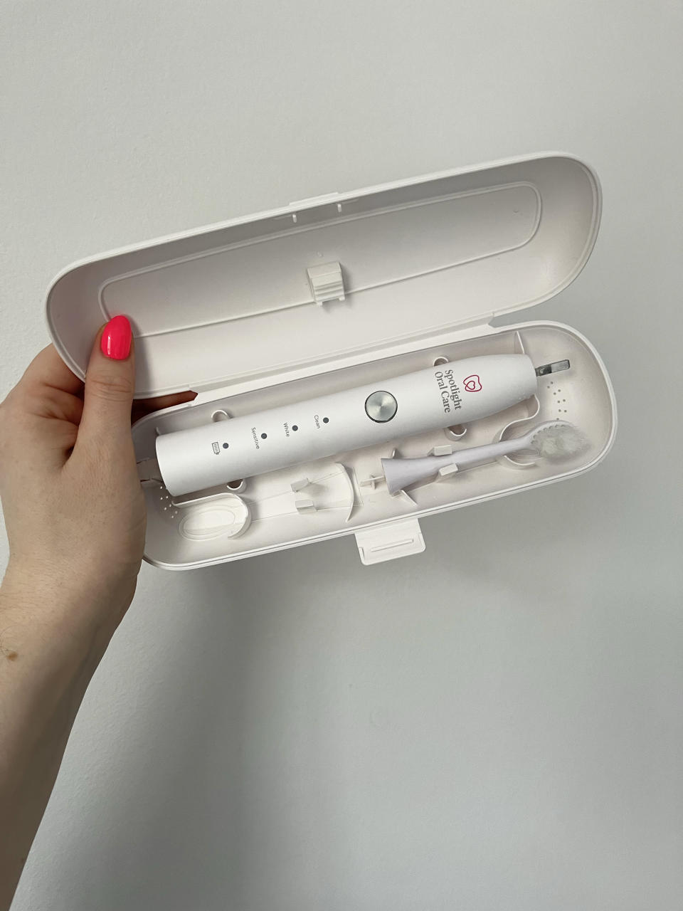 The travel case is compact and sleek, helping to protect the brush when packed in a suitcase. (Yahoo Life UK)