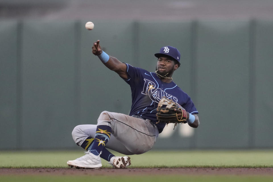Tampa Bay Rays shortstop Osleivis Basabe throws out San Francisco Giants' Patrick Bailey at first base during the second inning of a baseball game in San Francisco, Tuesday, Aug. 15, 2023. (AP Photo/Jeff Chiu)
