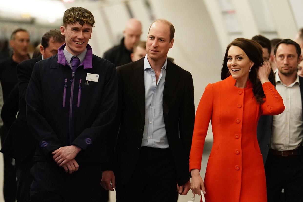 The Prince and Princess of Wales travel on London Underground's Elizabeth Line in central London (PA)