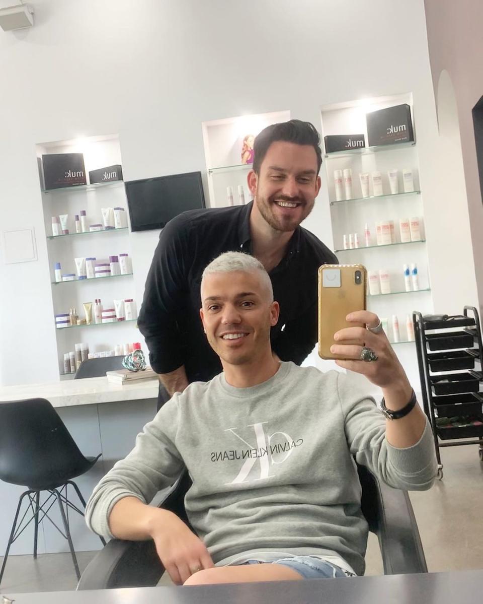 Anthony Callea takes a selfie at a hairdressers after having his hair bleached blonde