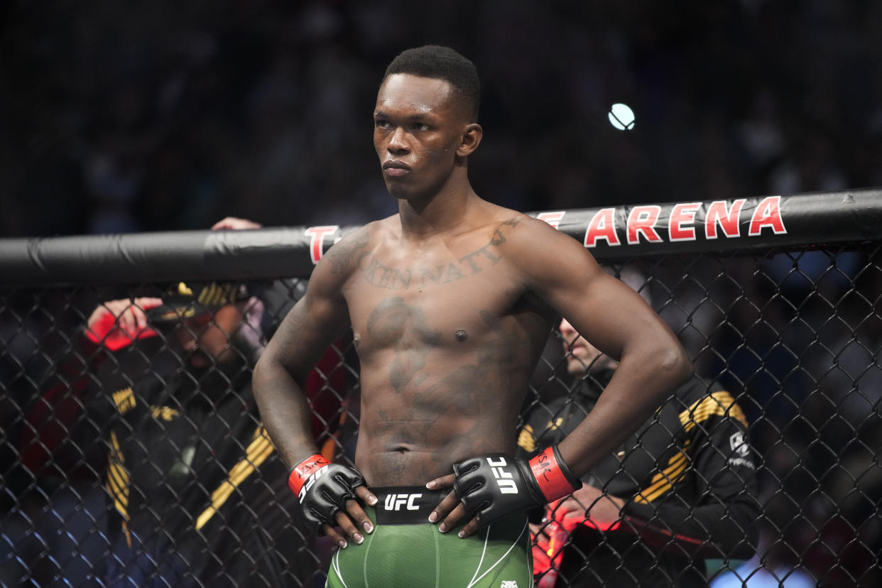 FILE - Israel Adesanya prepares to fight Jared Cannonier in a middleweight title bout during the UFC 276 mixed martial arts event Saturday, July 2, 2022, in Las Vegas. Adesanya has lost twice before to Alex Pereira, only in their old careers as kickboxers. Adesanya has since become one of UFC's best fighters and puts his middleweight title on the line against Pereira in the main event of UFC 281 Saturday, Nov. 12 at Madison Square Garden. (AP Photo/John Locher, File)