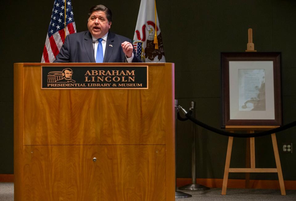 Illinois Gov. JB Pritzker, flanked by an original signed copy of the Emancipation Proclamation, delivers his remarks during a bill signing marking Juneteenth an official state holiday in Illinois at the Abraham Lincoln Presidential Library in Springfield, Ill., Wednesday, June 16, 2021. [Justin L. Fowler/The State Journal-Register] 