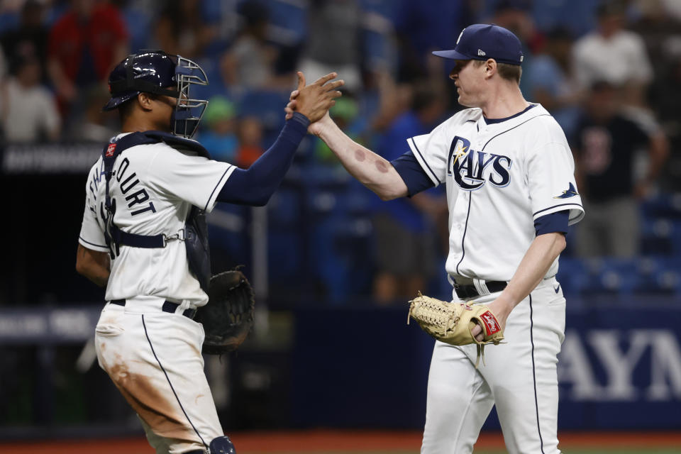 Tampa Bay Rays pitcher Pete Fairbanks, right, celebrates with catcher Christian Bethancourt after they defeated the Boston Red Sox in a baseball game Monday, Sept. 5, 2022, in St. Petersburg, Fla. (AP Photo/Scott Audette)