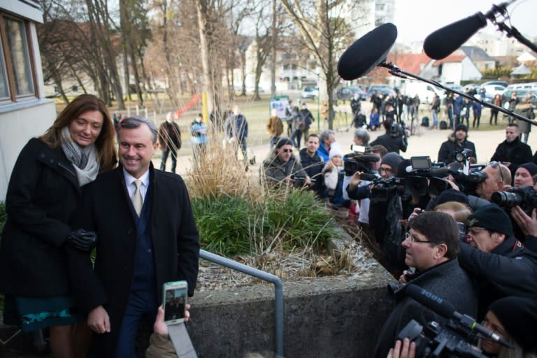 Austrian far-right Freedom Party presidential candidate Norbert Hofer and his wife Verena (L) arrive at a polling station in Pinkafeld, Austria, December 4, 2016