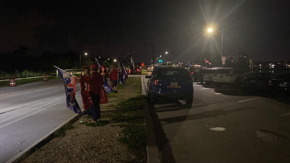 A dozen supporters of former President Donald Trump gathered not far from Mar-a-Lago on Thursday evening.