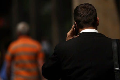 A man speaks on his mobile phone in New York City. "What probably entails some of the highest exposure is using your mobile for voice calls," said Kurt Straif, the scientist in charge of editing the IARC reports on potentially carcinogenic agents