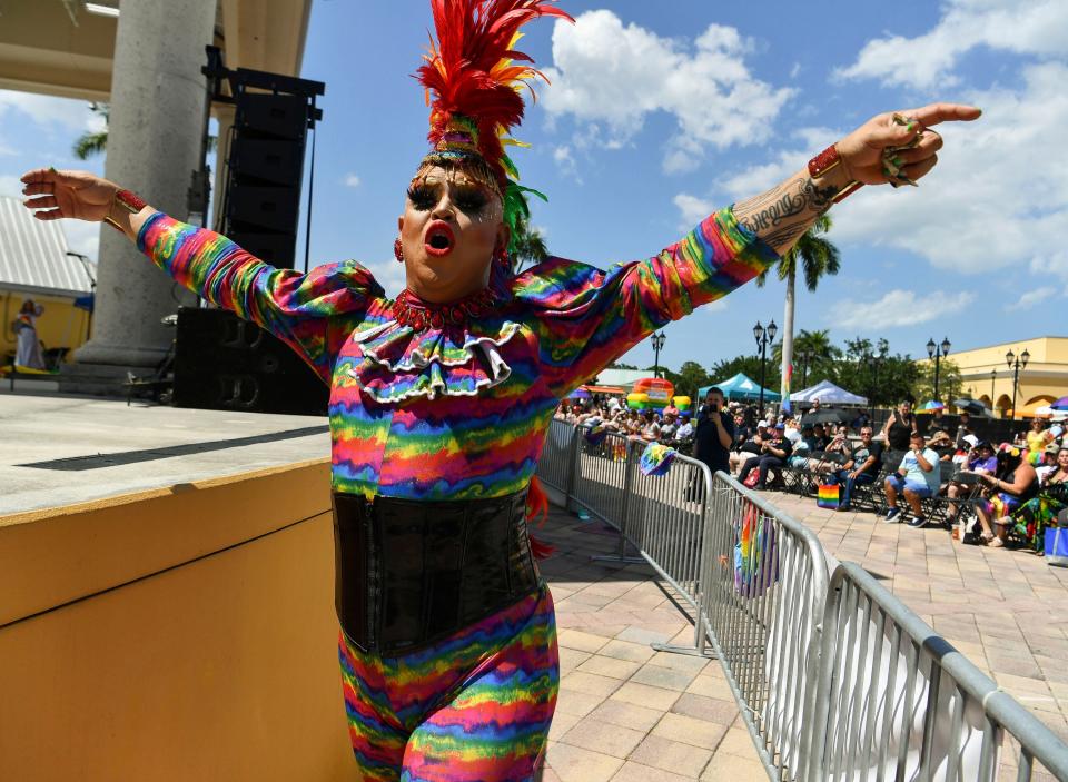 Drag queen T.P. Lords performs during the Treasure Coast Pridefest on Saturday, April 22, 2023, at the MIDFLORIDA Credit Union Event Center, 9221 S.E. Event Center Place, in Port St. Lucie. Organizers canceled Saturday's Pride parade and restricted the event to people 21 years and older because Gov. Ron DeSantis is expected to sign SB1438 into law soon. Pride Alliance of the Treasure Coast, which organizes the annual Pridefest, said they are "upset and disheartened" at the last-minute change, and some parents who had planned to take their children said they are angry.
(Photo: CRYSTAL VANDER WEIT/TCPALM)