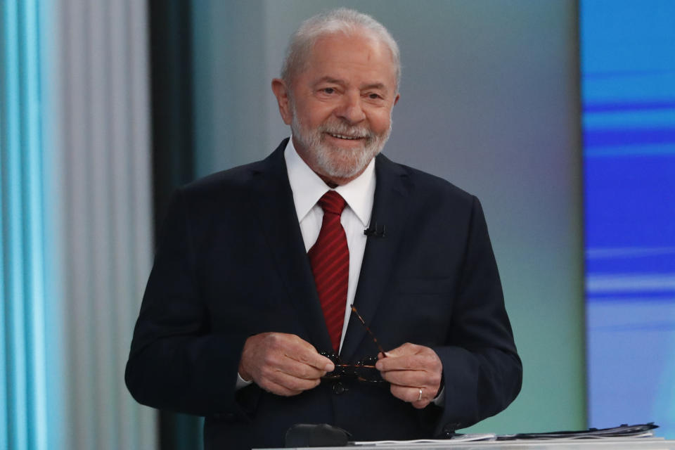 Brazil's former President Luiz Inacio Lula da Silva, who is running for reelection, smiles prior to a presidential debate in Rio de Janeiro, Brazil, Friday, Oct. 28, 2022. Da Silva will face Brazilian President Jair Bolsonaro in a presidential runoff on Oct. 30. (AP Photo/Bruna Brado)