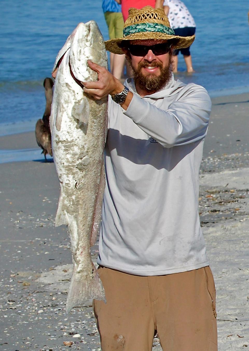 Ben Homan, of Clermont, caught this big over slot size redfish on a live pinfish while fishing the beach near the jetty at John's Pass in Madeira Beach this past weekend. 