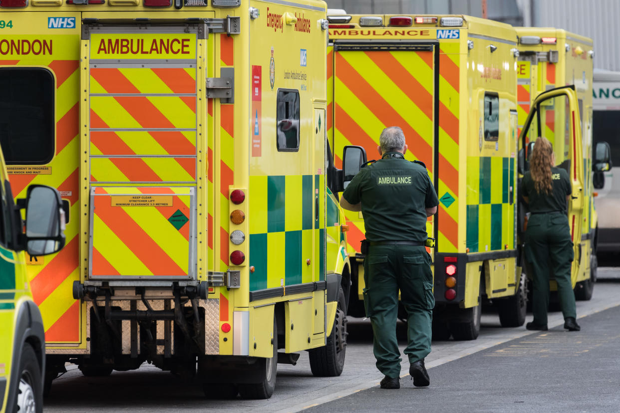 Paramedics stand next to the ambulances outside the emergency department at the Royal London Hospital, on 15 January, 2021 in London, England. Hospitals across the country are dealing with an ongoing rise in Covid-19 cases, providing care to more than 35,000 people, which is around 50% more than at the peak of the virus in spring, with fears that hospitals in London may be overwhelmed within two weeks unless the current infection rate falls. (Photo by WIktor Szymanowicz/NurPhoto via Getty Images)